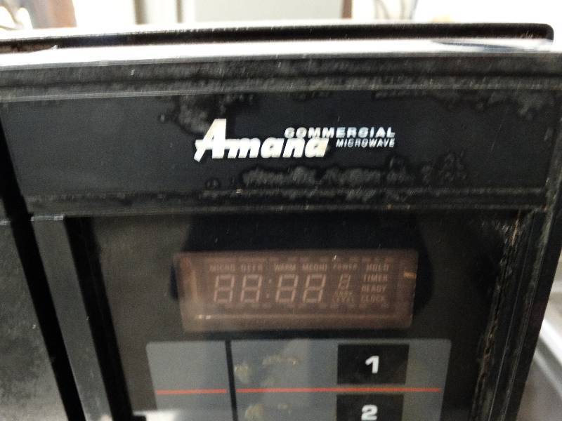 lot 2545 image: Amana Commercial Microwave. Powers on.