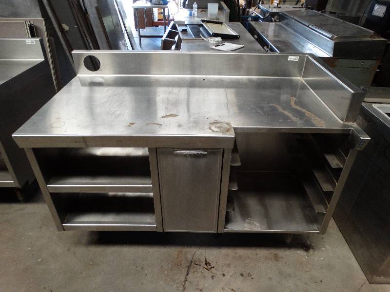 lot 2548 image: 5W x  32 Stainless steel table with backsplash along back and right side. Pins on the left and holes on the right for connecting other tables and equipment.