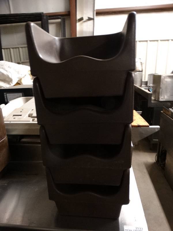 lot 2587 image: Lot of 4 brown booster seats.