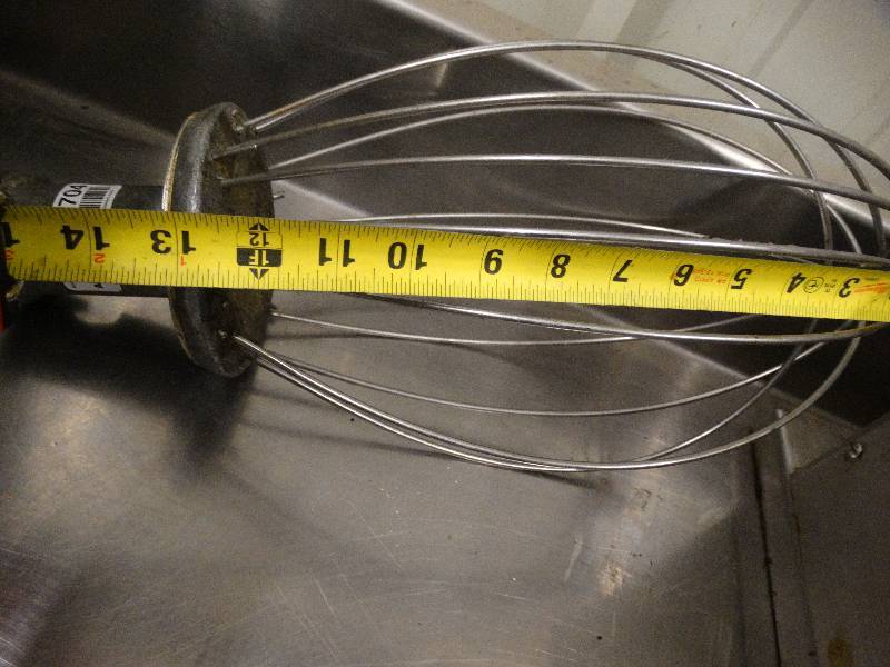 lot 2704 image: Hobart mixer attachment.