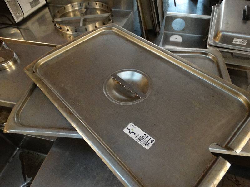 lot 2714 image: Lot of 2 stainless steel lids.