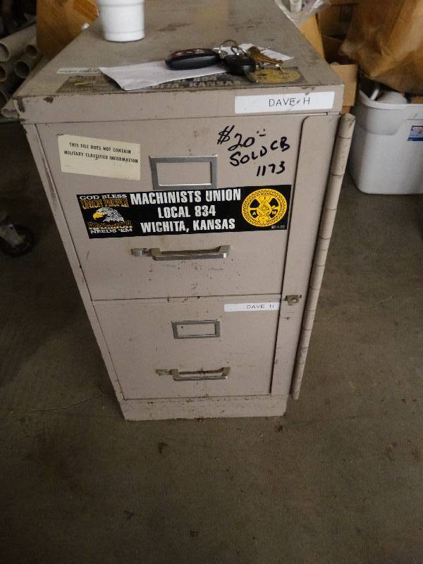 lot 2731 image: File cabinet with heavy locking bar.