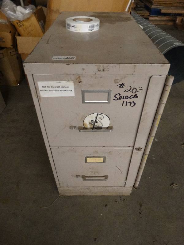 lot 2732 image: File cabinet with heavy locking bar.