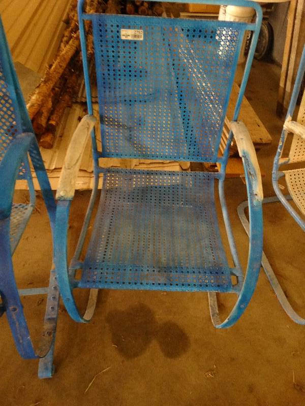 lot 2752 image: Metal patio chair with spring steel legs for rocking.