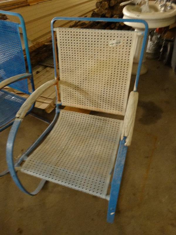 lot 2753 image: Metal patio chair with spring steel legs for rocking.