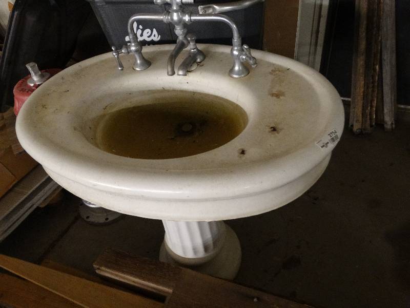 lot 2754 image: Pedestal sink with faucet.