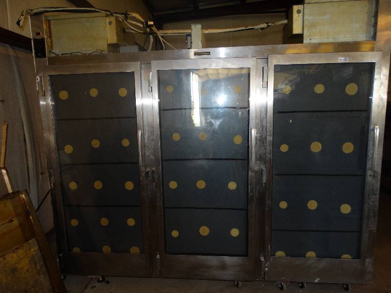 lot 6093 image: Traulsen commercial refrigerator andor freezer. Inside of back glass doors are mirrored.