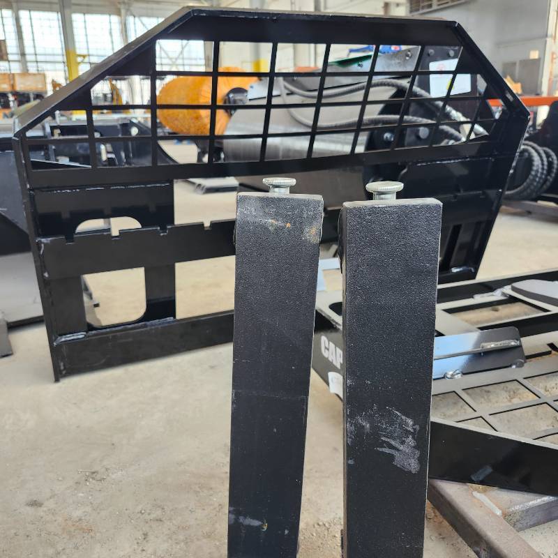 lot 7006 image: Unused Skid Steer Forklift Fork Extensions with Mounting Frame&nbsp