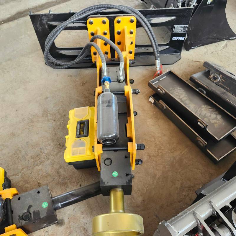 lot 7011 image: Unused Hydraulic Skid Steer Post Pounder Attachment w Toolbox&nbsp