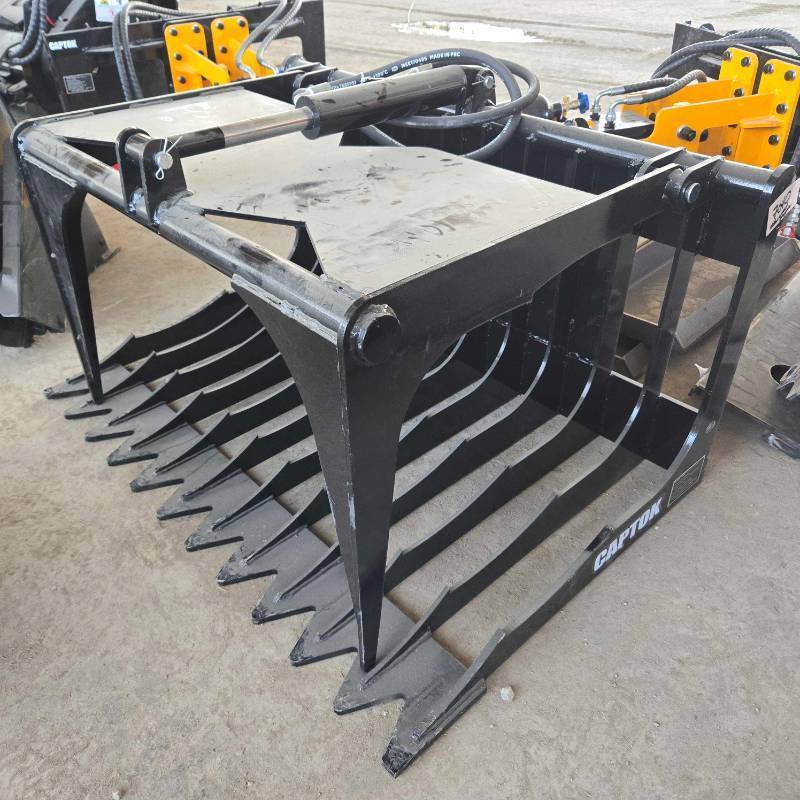 lot 7040 image: Unused Hollow Wood Grabber MINI Skid Steer Attachment  CK-HWG44C&nbsp
