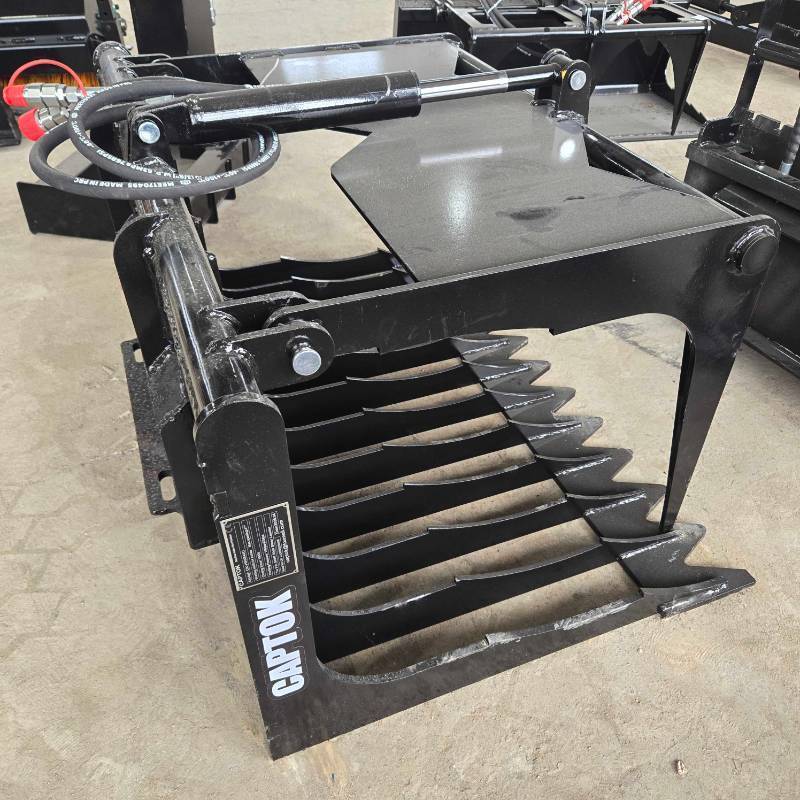 lot 7220 image: Unused MINI Captok CK-HWG44C Skid Steer Wood Grabber Attachment&nbsp