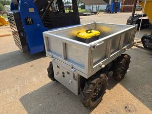 lot 63 image: Unused Heavy Duty Motorized Utility Dump Cart  Remote Control