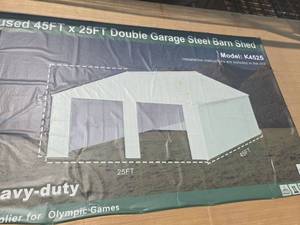 lot 8125 image: Unused 45x25ft Steel Barn Shed  Model K4525