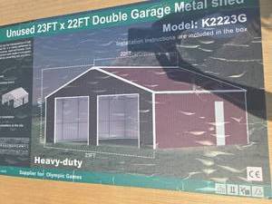 lot 8130 image: Unused 23x22 FT Double Garage Metal Shed K2223G