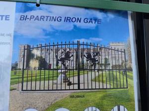 lot 4030 image: Decorative Bi-Parting Iron Gate with Lion Design