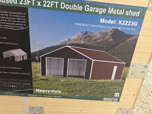lot 9025 image: Unused KJ 23x22ft Heavy-Duty Double Garage Metal Shed K2223G