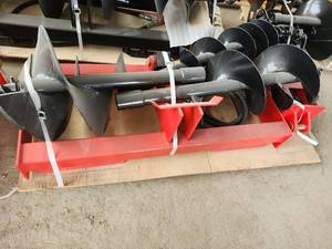 lot 7518 image: Unused Heavy Duty Post Hole Auger Attachment with Multiple Bits  Red