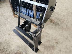 lot 7575 image: Unused Captok Mini Skid Steer Forks