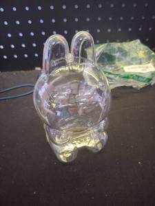 lot 4218 image: Small Plastic Container In The Shape Of A Bunny