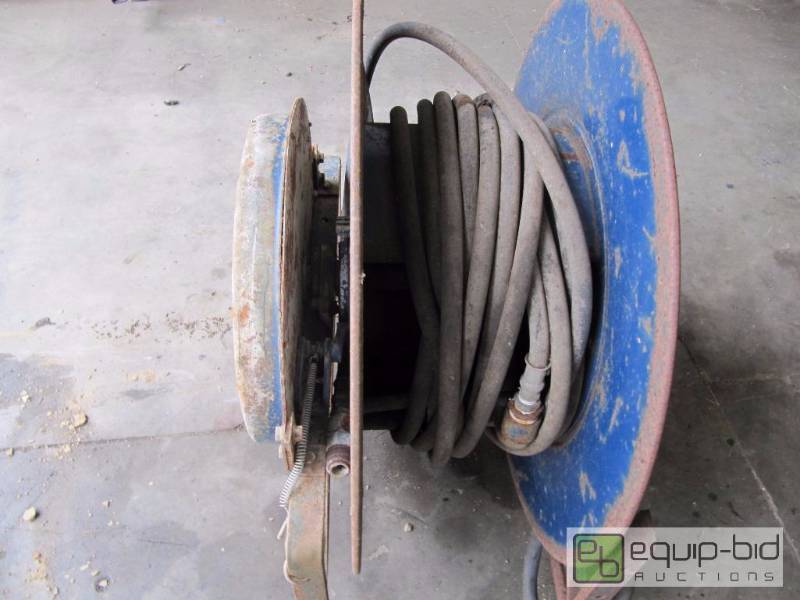 lot 403 image: Over Head Hose Wheel For Shop