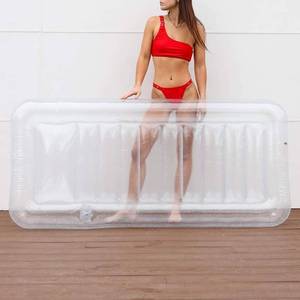 lot 5327 image: Clear Lounger by L�TELI - Transparent Inflatable Chaise Pool Float for Adults - Minimal Aesthetic for Pool Parties, Summer Fun & Ultimate Relaxation - Durable & Easy to Inflate - Cup Holder