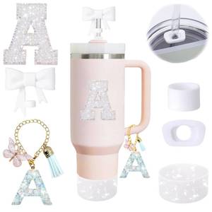 lot 12247 image: 6PCS White Stanley Cup Accessories Set Fit for Stanley Cup 30oz 40oz. Including Handle Charm, Personalized Initial Sticker, Straw Topper, Sparkly Silicone Boot, Spill Proof Stopper (Letter-A)