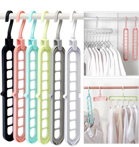 lot 10853 image: Closet Organizers and Storage,College Dorm Room Essentials,Pack of 6 Multifunctional Organizer Magic Space Saving Hangers with 9 Holes Storage Organization for Wardrobe Closet