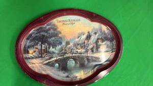 lot 422 image: Thomas Kinkade Oval Collector Tin Plate - Winter Scene 12in x16in - Retail $45