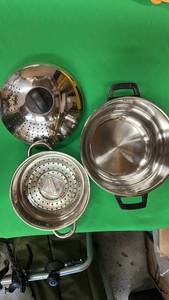 lot 439 image: Pot with Vented Lid and stainless Vegetable Steamer or Strainer.