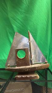 lot 511 image: Handcrafted Metal and Wood Sailboat Sculpture - Retail $125