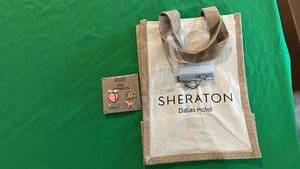 lot 563 image: Cloth Bag, Surgical Stainless Still Clippers with Case, and 4 Piece PINK Pins.