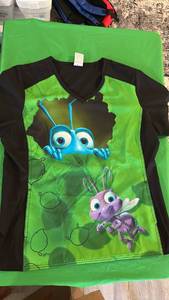 lot 571 image: A Bugs Life Scrub Top Sz Lg - Retail $25