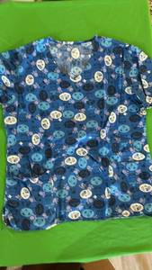 lot 572 image: Blue and White Animal Print Scrub Top - Retail $25