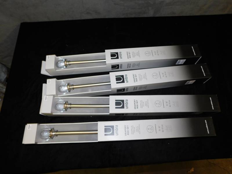 lot 2042 image: Lot of Umbra Drapery Rod Sets