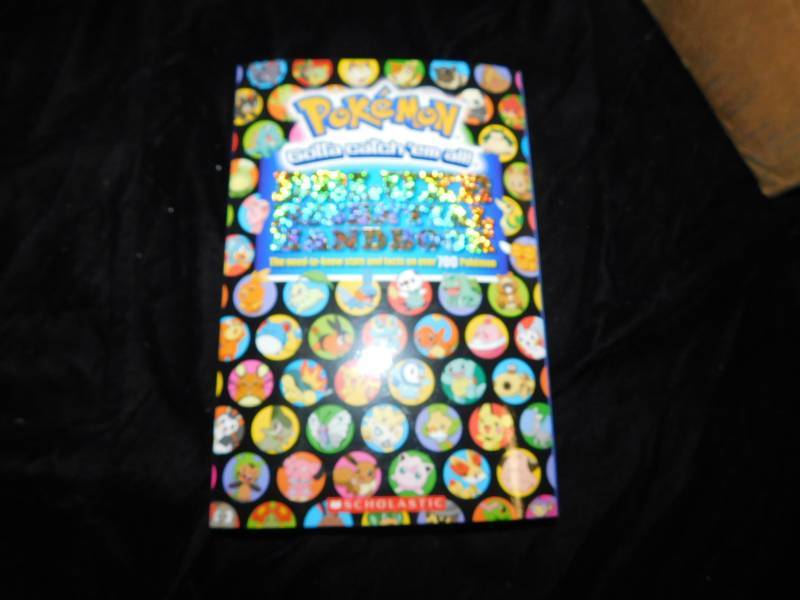 lot 2112 image: Lot of Pokemon Deluxe Essential Handbooks