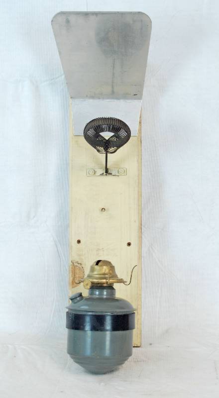 lot 3038 image: Vintage Hurricane Oil Lamp mounted on wood with smoke shield (missing globe) - matching lamp on Lot # 3037