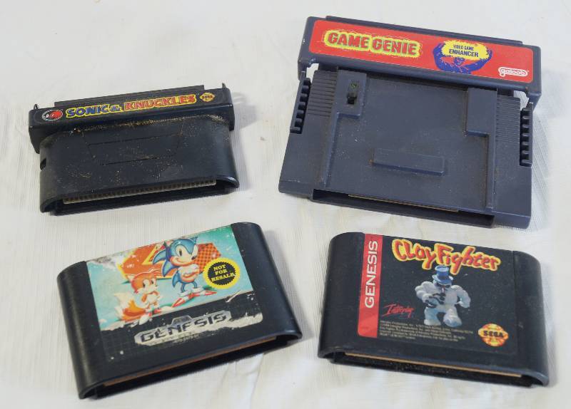 lot 1337 image: Lot of 3 SEGA Games and GAME GENIE