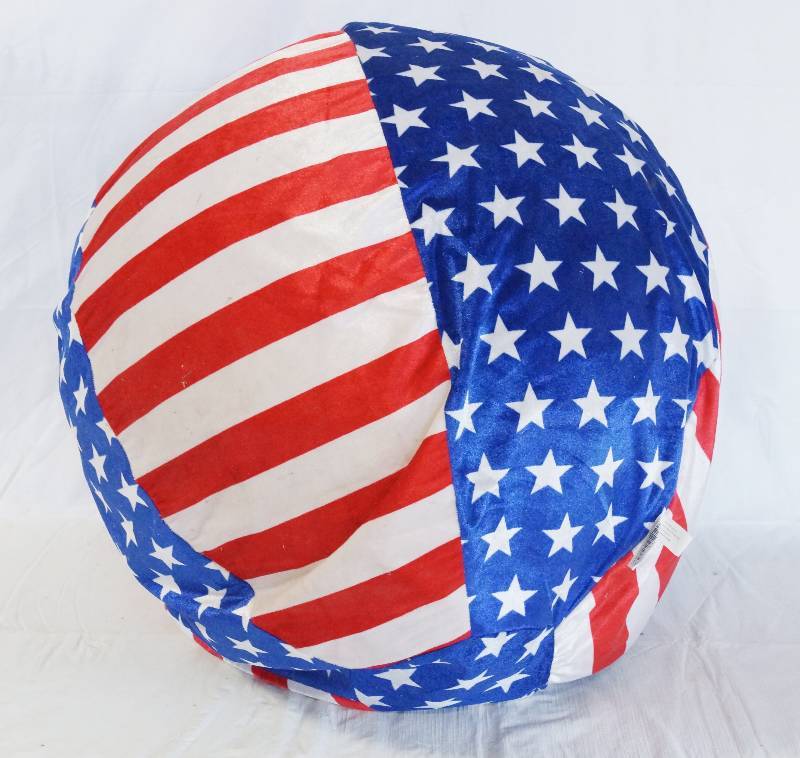 lot 1341 image: BIG Bouncy Ball Covered w Velvet Flag Cover - BIG Over 2 Feet Across Great for the lake or a Rock Concert