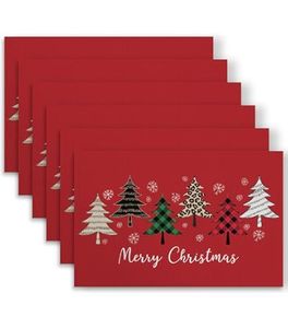 lot 1198087 image: Christmas Trees Placemats Winter Holiday Washable Table Mats Set of 4 for Home Party Kitchen Dining Decorations - Retail $9