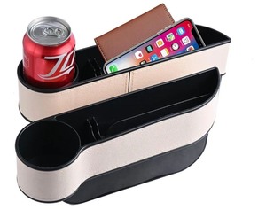 lot 1198329 image: Car Seat Gap Filler Organizer 2-Pack with Cup Holder, Seat Hooks, and Storage Box - Multifunctional Car Accessories for Food and Phone (White) - Retail $12