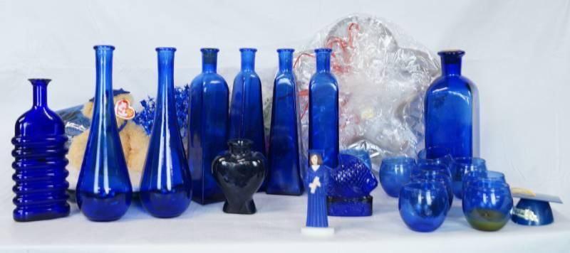 lot 1394 image: Lot of Cobalt Blue Home Decor and More - Really cool bottles and candle holders