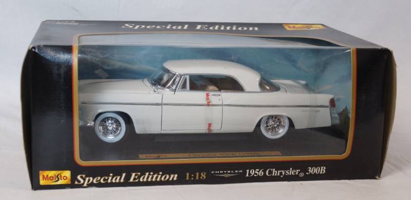 lot 1409 image: Die Cast Metal Replica - 1956 Chrysler 300B - New in original box 118 scale - Maisto - opening doorshood and moving parts COOL