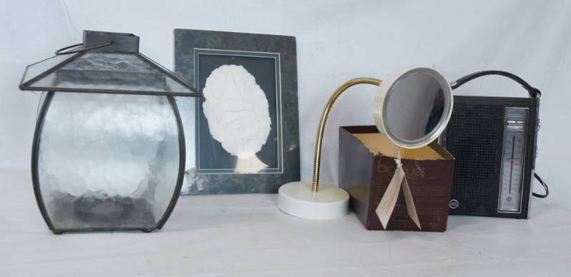 lot 3420 image: A Lot Of Cool Housewares Magic Focus Magnifying Mirror, Paper Bird Sculpture, Glass Hanging Candle Holder And More