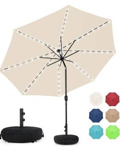lot 200 image: Sundale Outdoor Solar 80 LED 9 ft Patio Umbrella with Sand Bag Umbrella Base, Outdoor Umbrella with Tilt and Crank Beige