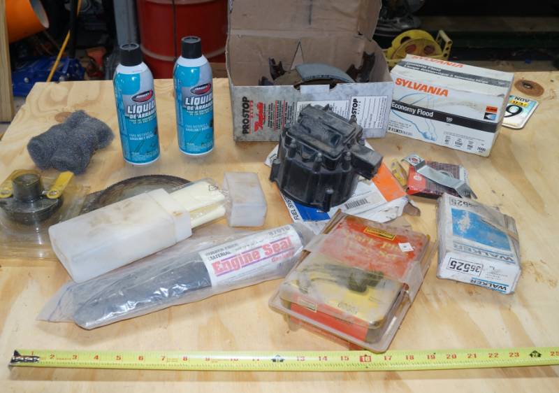 lot 2450 image: Misc Lot - Contents on Table - Misc Car Parts and More
