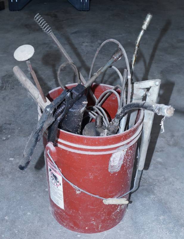 lot 2489 image: Bucket Full of Grease Guns