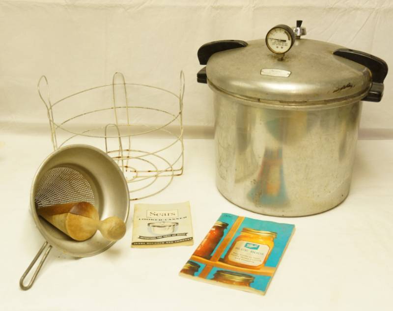 lot 2629 image: Vintage Canning Lot - SEARS - Pressure Canner  Cooker w Rack, Gauge, Weight and Original Books and Food Mill Grinder w pestle