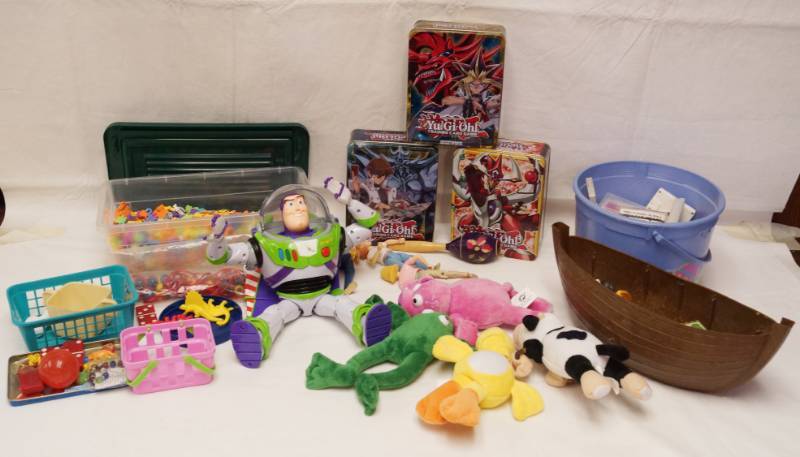 lot 2656 image: Lot of Kids Stuff - Buzz Lightyear, Yugio Tins, Fun Jewelry Beads, Various Toys, Cassettes and More