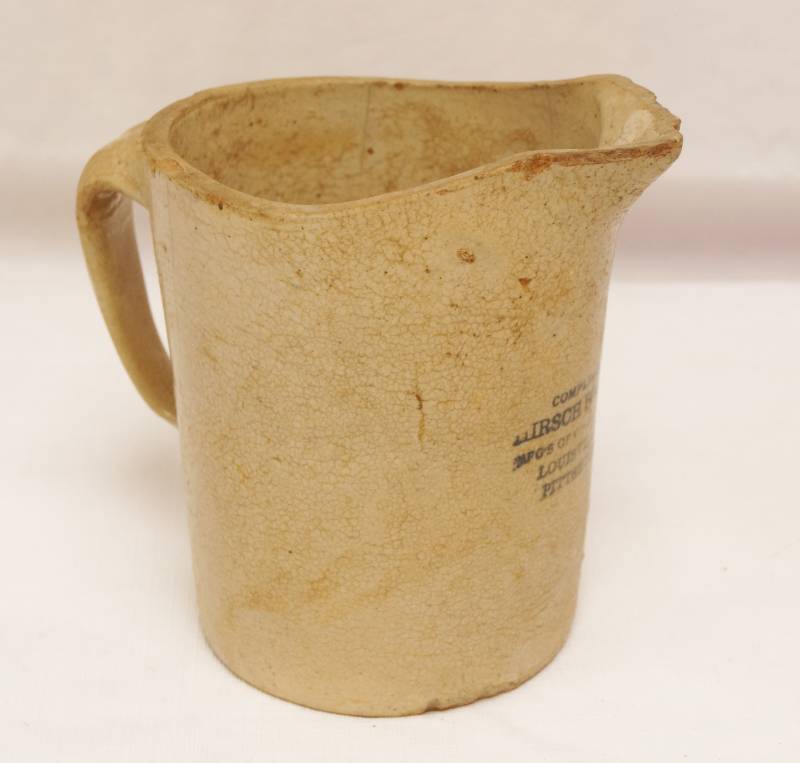 lot 2666 image: Vintage Stoneware Crock Pitcher - Compliments of HIRSCH BROS & CO - WOW