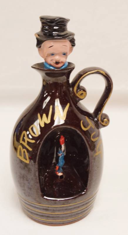 lot 2667 image: Vintage Brown Jug Music Box - Plays Little Brown Jug when lifted - Works - Excellent Condition - Very Collectible